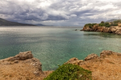 Küstenlandschaft mit Wolken, Attika, Griechenland.